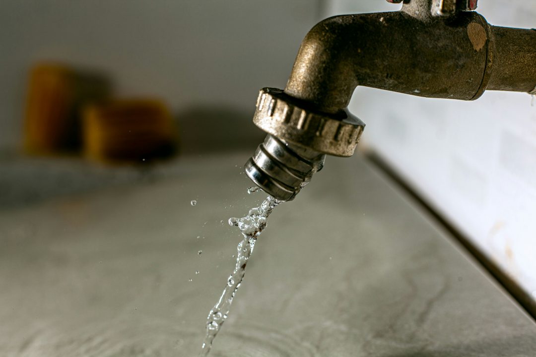 Drinking water is typically kept under constant pressure within household plumbing to maintain a steady flow