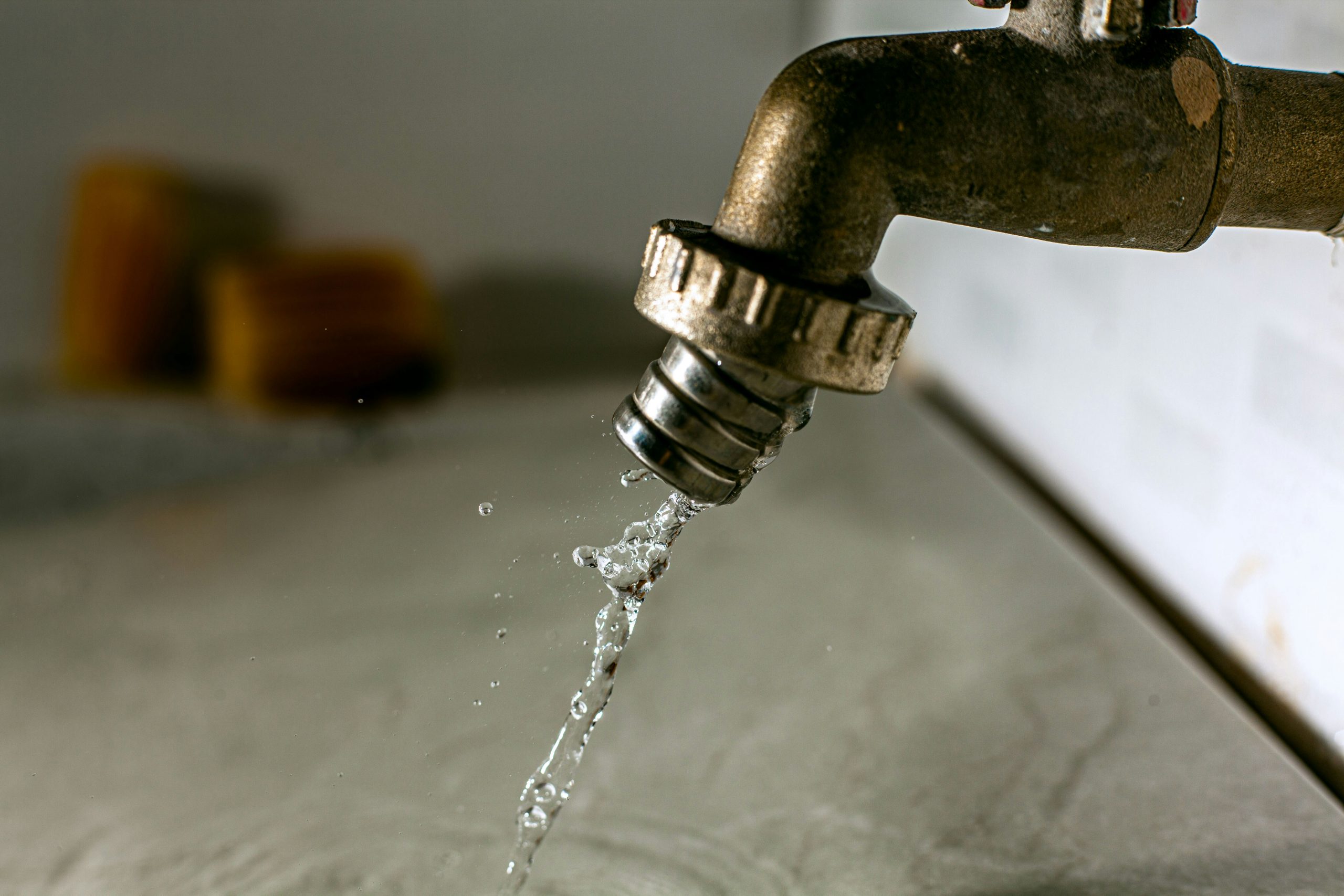 Drinking water is typically kept under constant pressure within household plumbing to maintain a steady flow